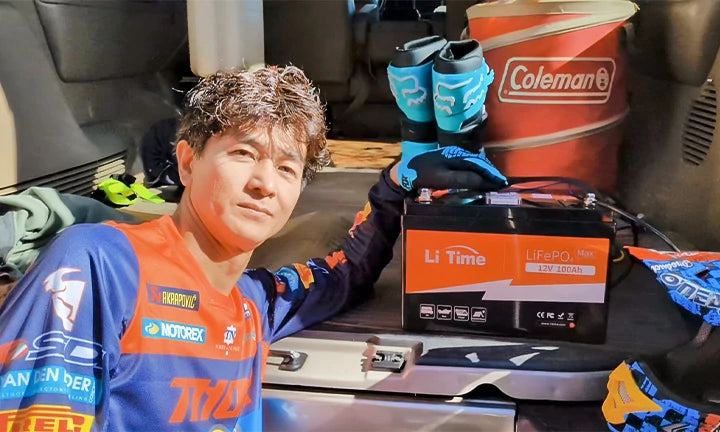 A man with LiTime 12V 100Ah max showcasing energy solutions for camper setups